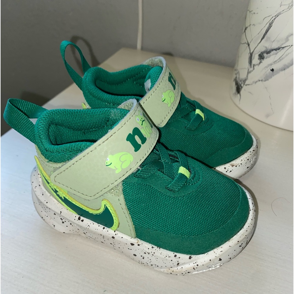 Nike green baby shoes.